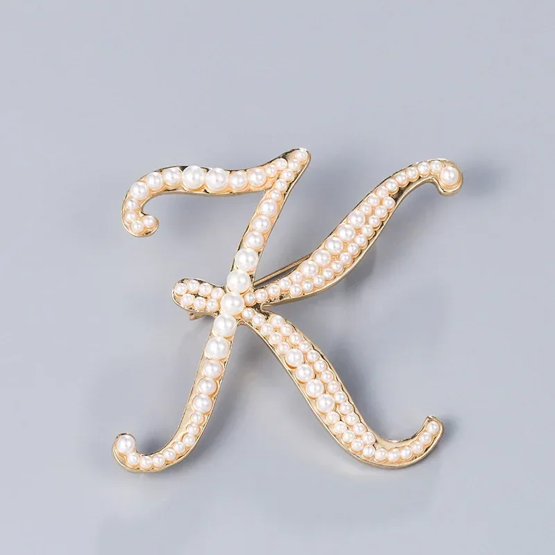 Broches de perlas A K D con le - Women Accessories In English reseña y precio