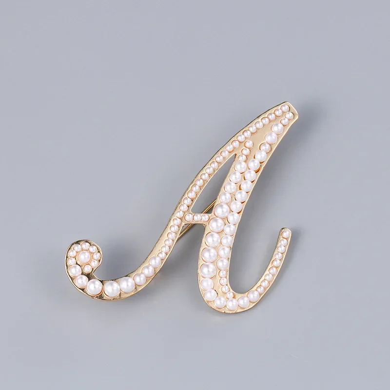 Broches de perlas A K D con le - Women Accessories In English reseña y precio